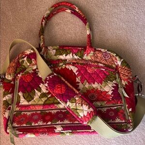 The Vera Bradley Metropolitan travel bag with matching Kisslock Coin Purse.